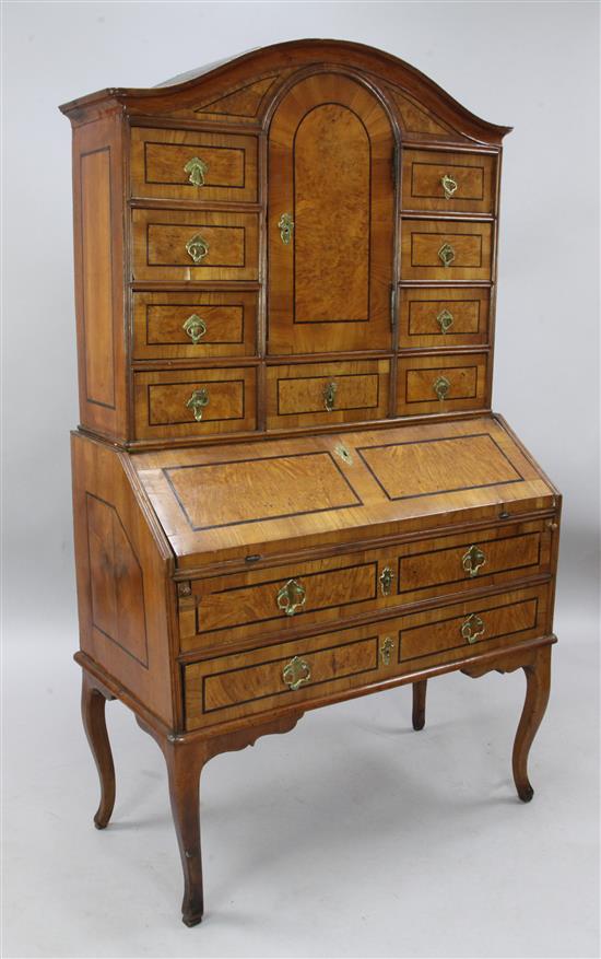 An 18th century German walnut bureau cabinet, W.3ft 2in. D.1ft 8in. H.5ft 6in.